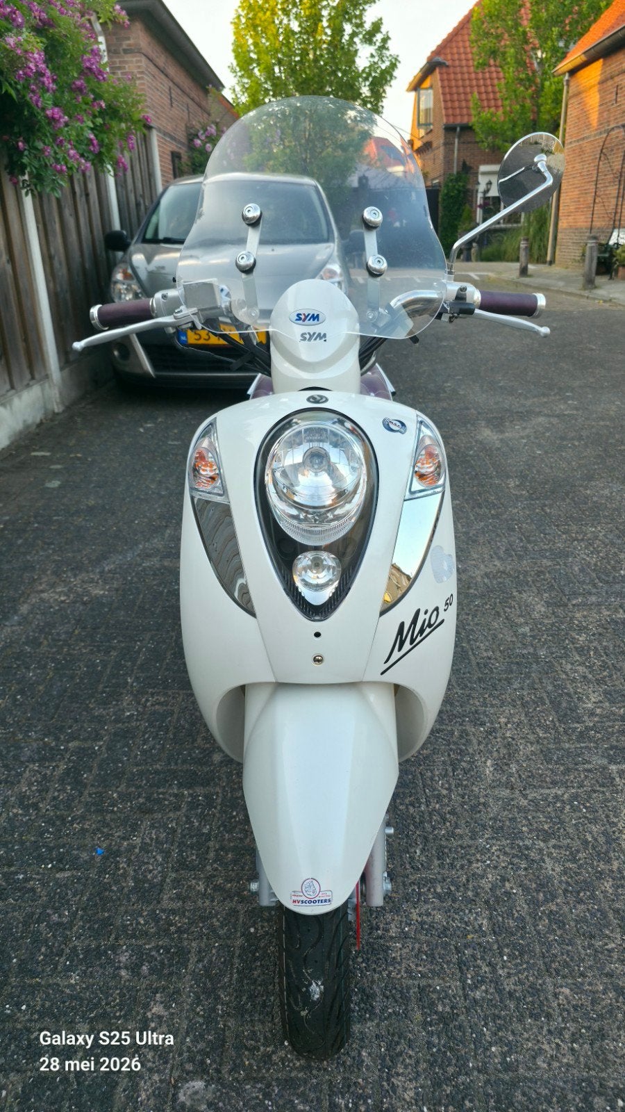 Sym Mio 50 scooter - Wit met paars diamanten zadel, Ophalen, Gebruikt, 49 cc, Benzine
