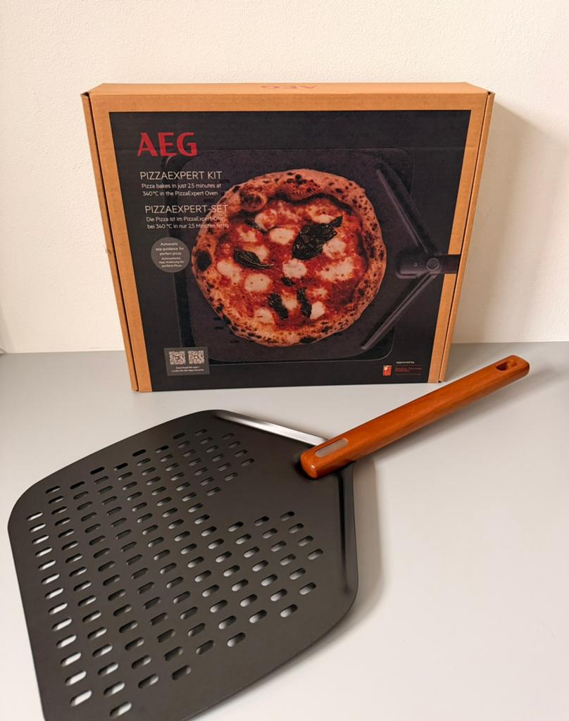 AEG pizzaplaat gietijzer & schep | BBQ - oven - kookplaat, Ophalen of Verzenden, Nieuw