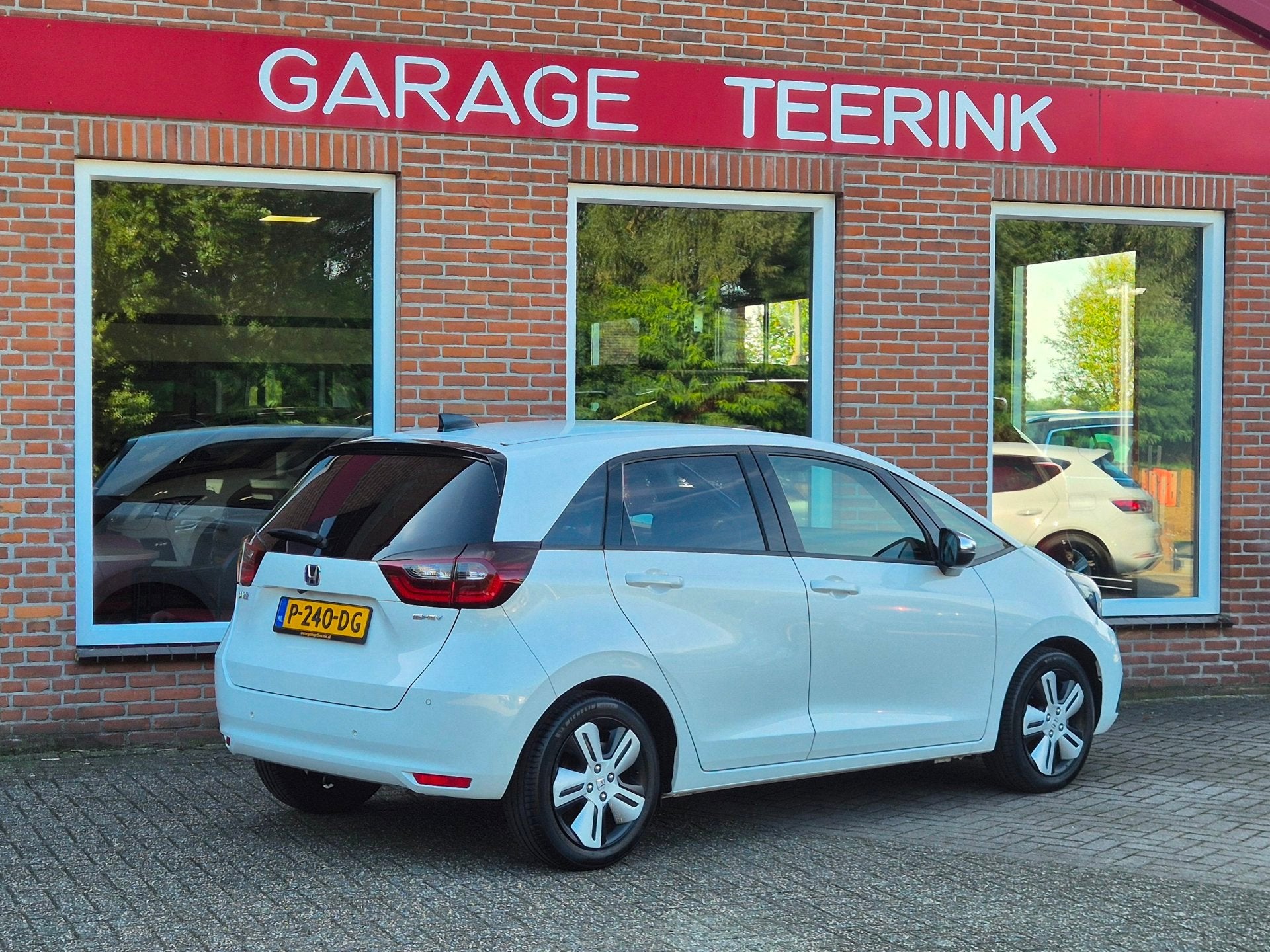 Honda Jazz 1.5 e:HEV Hybrid Executive 109PK 5drs AUTOMAAT cl, Auto's, Honda, Euro 6, Leder en Stof, Wit, Bedrijf