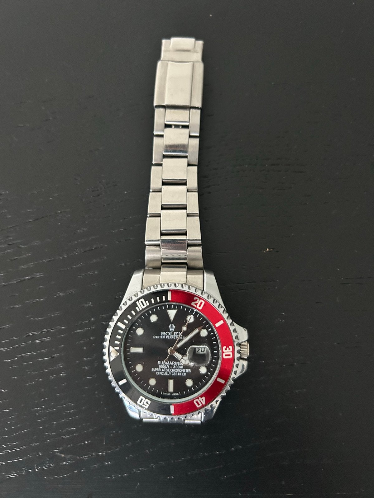 Rolex Submariner Polshorloge - Zwart/Rood, 70€, Polshorloge, Ophalen of Verzenden, Zo goed als nieuw, Rolex