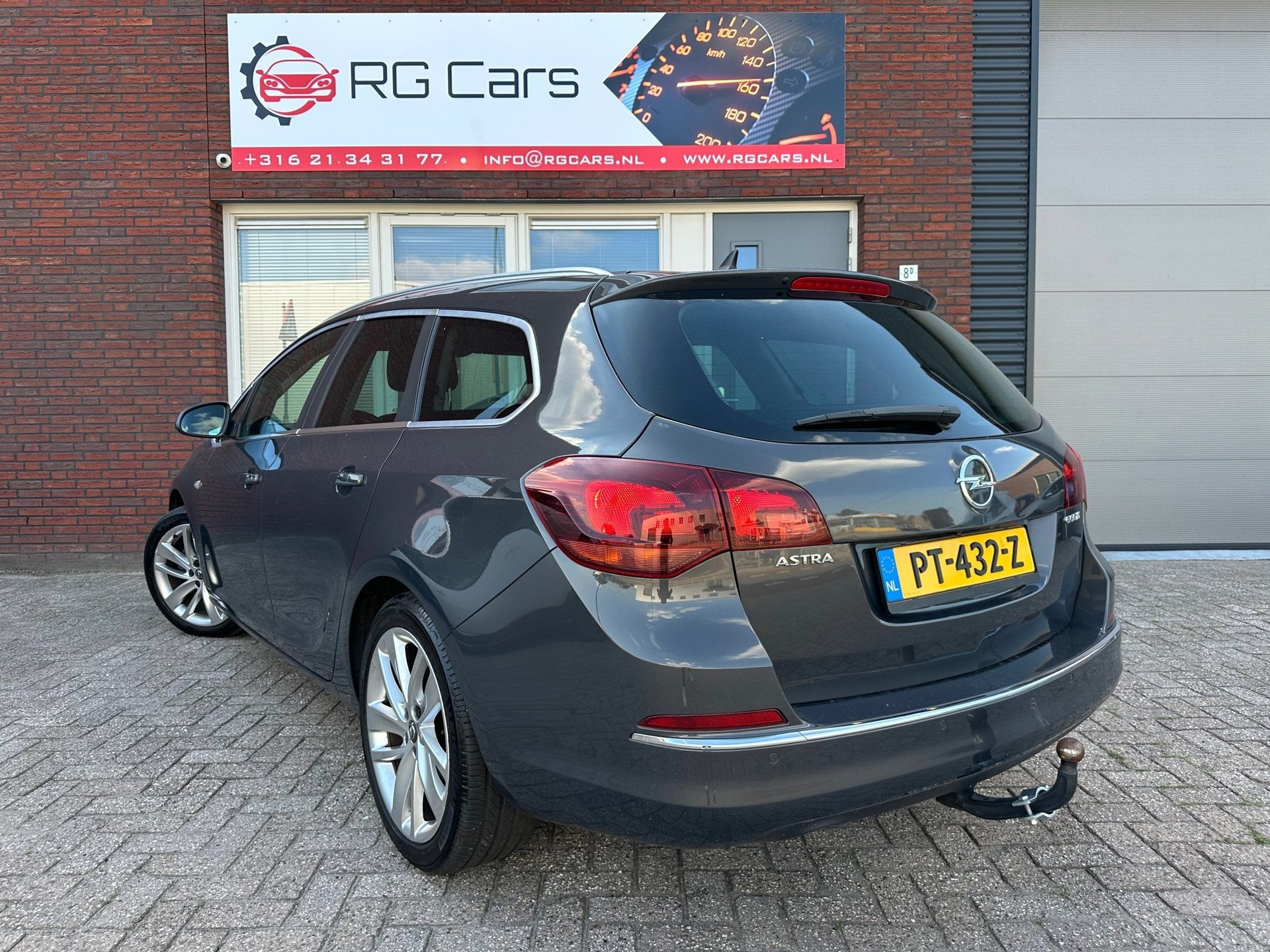 Opel Astra Sports Tourer 1.4 Turbo Sport / Navi / Leder / Ca, Auto's, Voorwielaandrijving, Euro 5, Gebruikt, 4 cilinders