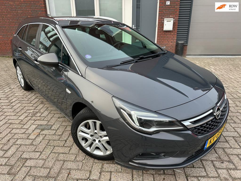 Opel Astra Sports Tourer 1.0 Edition / Airco / Cruise / Navi, Voorwielaandrijving, Stof, Gebruikt, Met garantie (alle)
