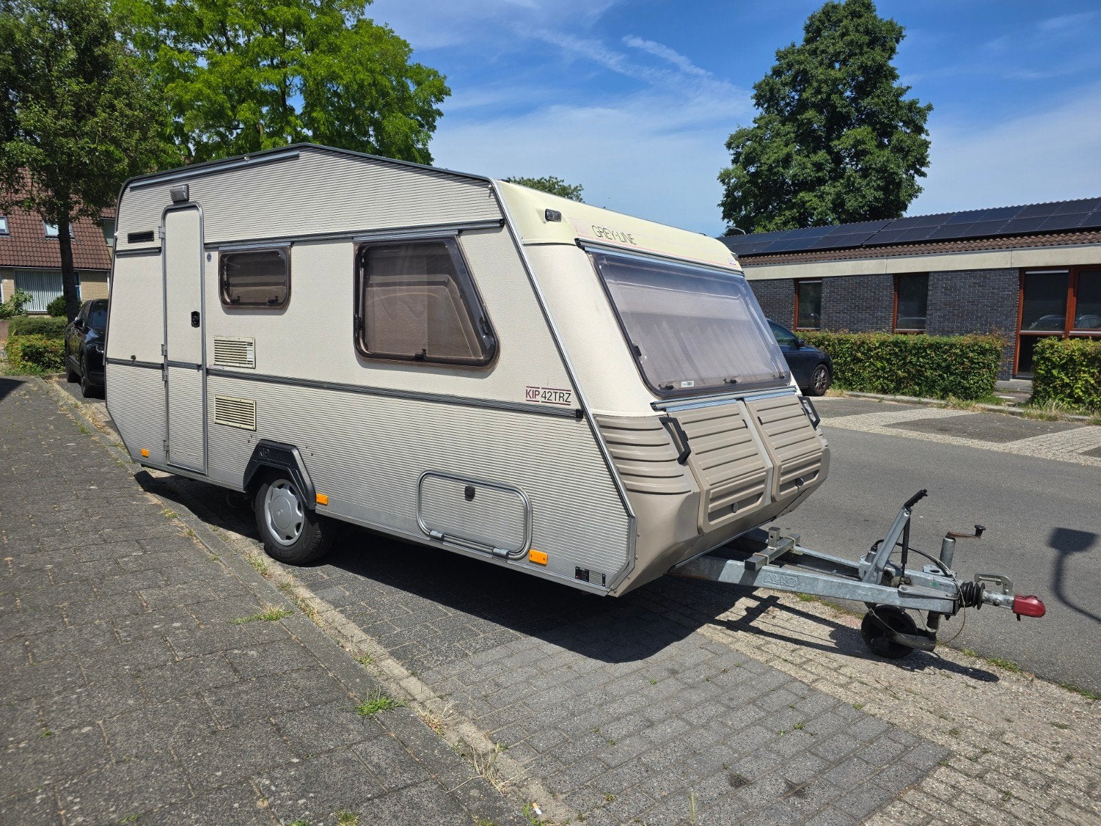 Kip Greyline 42TRZ - Compacte caravan met vast bed, Caravans en Kamperen, Caravans, Vast bed, Luifel, Kip, Treinzit