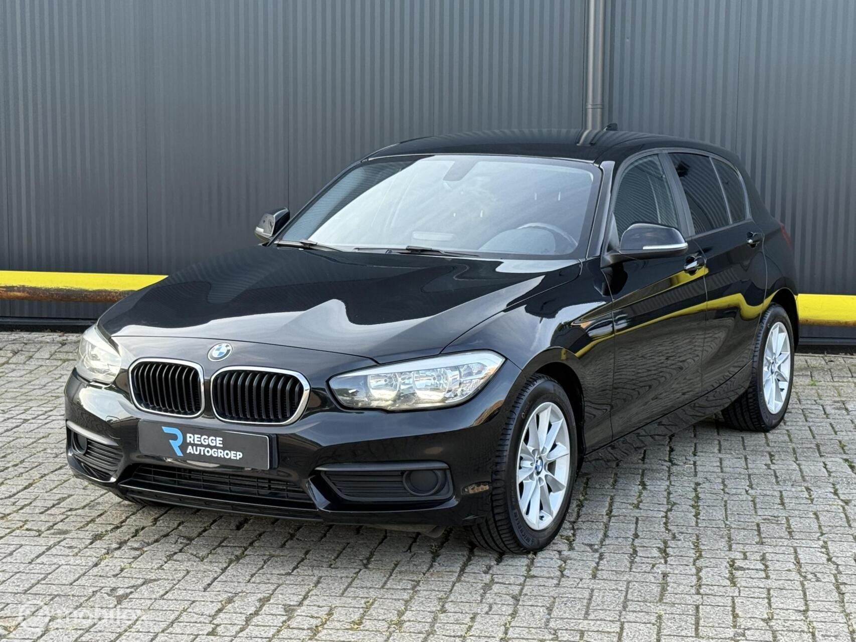 BMW 1-serie 116i High Executive NAVI, 1-Serie, Achterwielaandrijving, Euro 6, Zwart