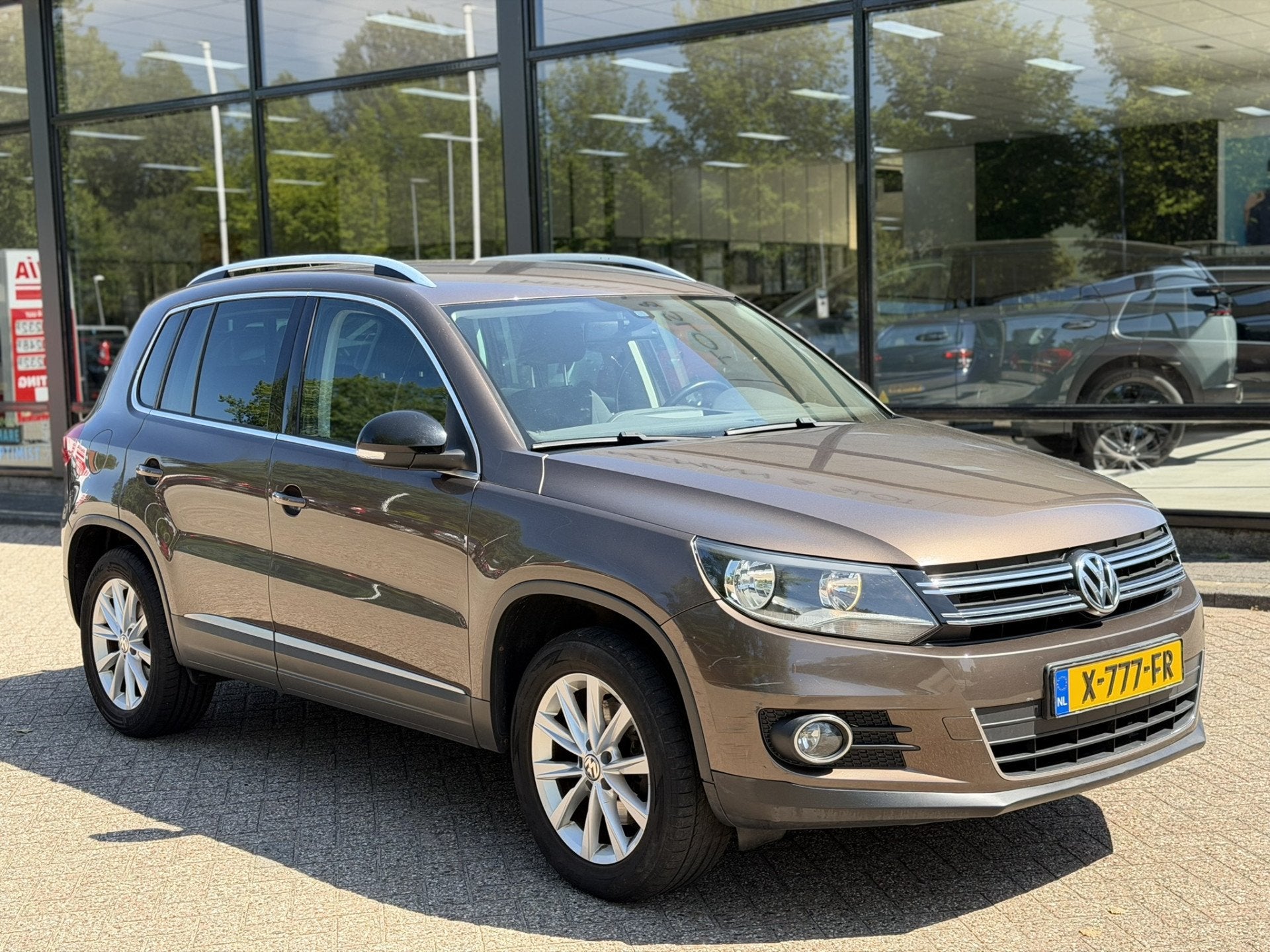 Volkswagen Tiguan 1.4 TSI Comfort&Design (bj 2013), Auto's, Voorwielaandrijving, Euro 5, Gebruikt, Zwart