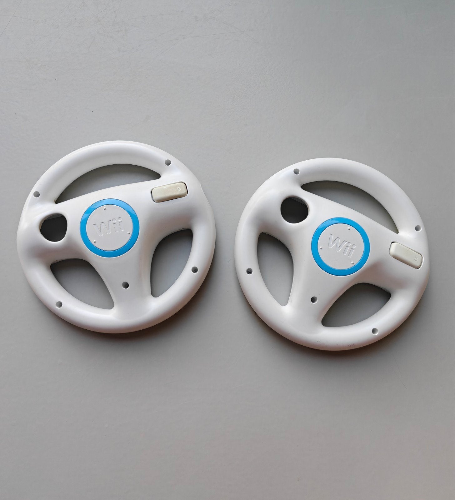 2x Nintendo Wii stuur origineel, Ophalen of Verzenden, Zo goed als nieuw, Wii, Stuurtje of Sportattribuut