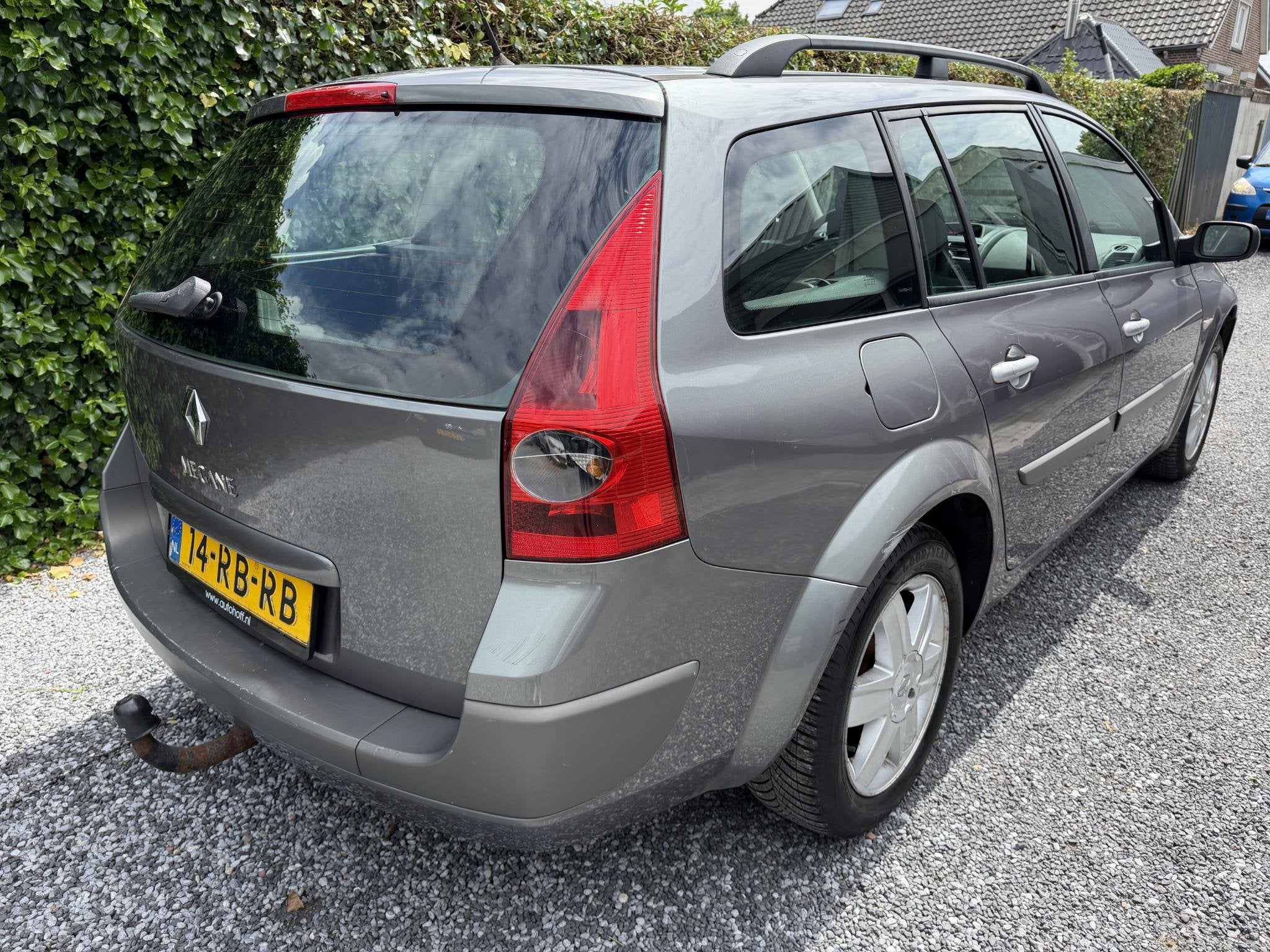 Renault Mégane Grand Tour 1.6-16V Privilège Luxe | Autom., Auto's, Renault, Stof, Gebruikt, 4 cilinders, Metallic lak