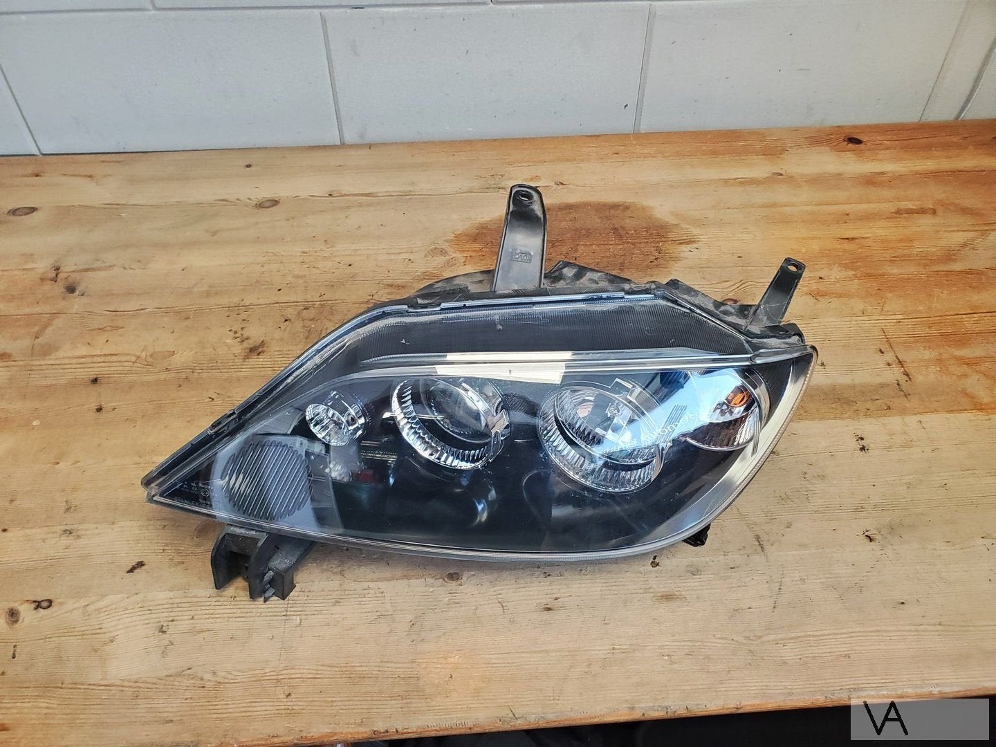 Mazda 2 2002 - 2007 koplamp links nette staat facelift €150, Gebruikt, -, -, Ophalen of Verzenden