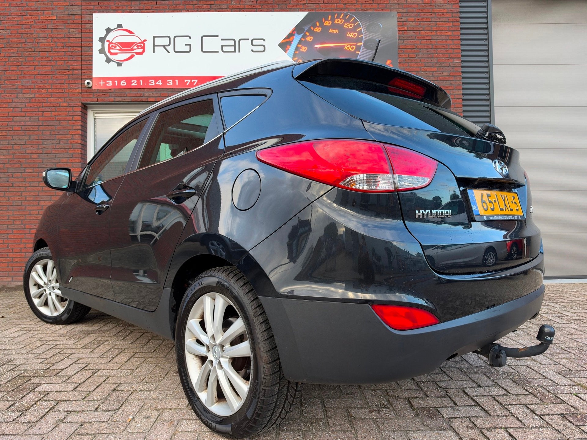 Hyundai Ix35 2.0i i-Catcher / Pano / Leder / Navi / Camera /, Auto's, Gebruikt, 4 cilinders, Met garantie (alle), Leder en Stof