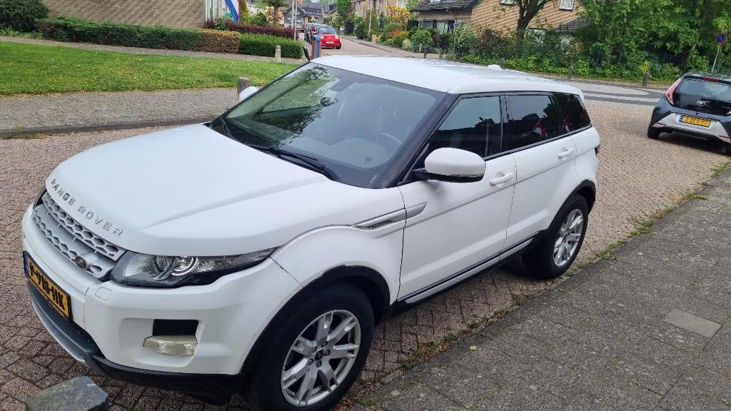 Land Rover Range Rover Evoque 2.2 TD4 4WD AUT 2012 Wit, Auto's, Euro 5, 1800 kg, Zwart, Wit