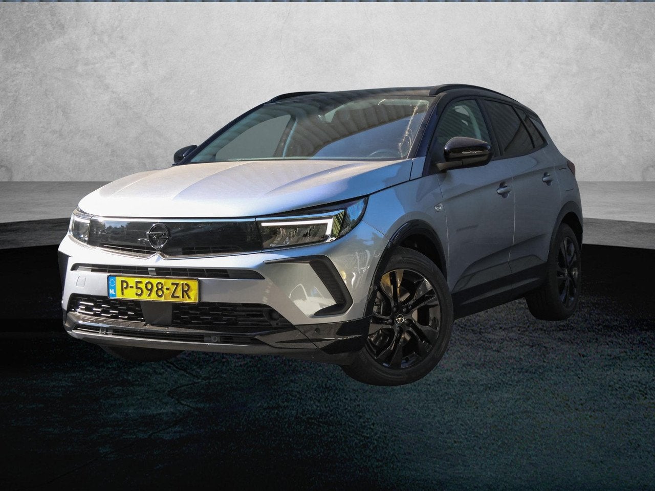 Opel Grandland 1.6 225pk Hybrid GS Line | ACCU 93% | Navigat, Verwarmde buitenspiegels, Gebruikt, 4 cilinders, Bedrijf