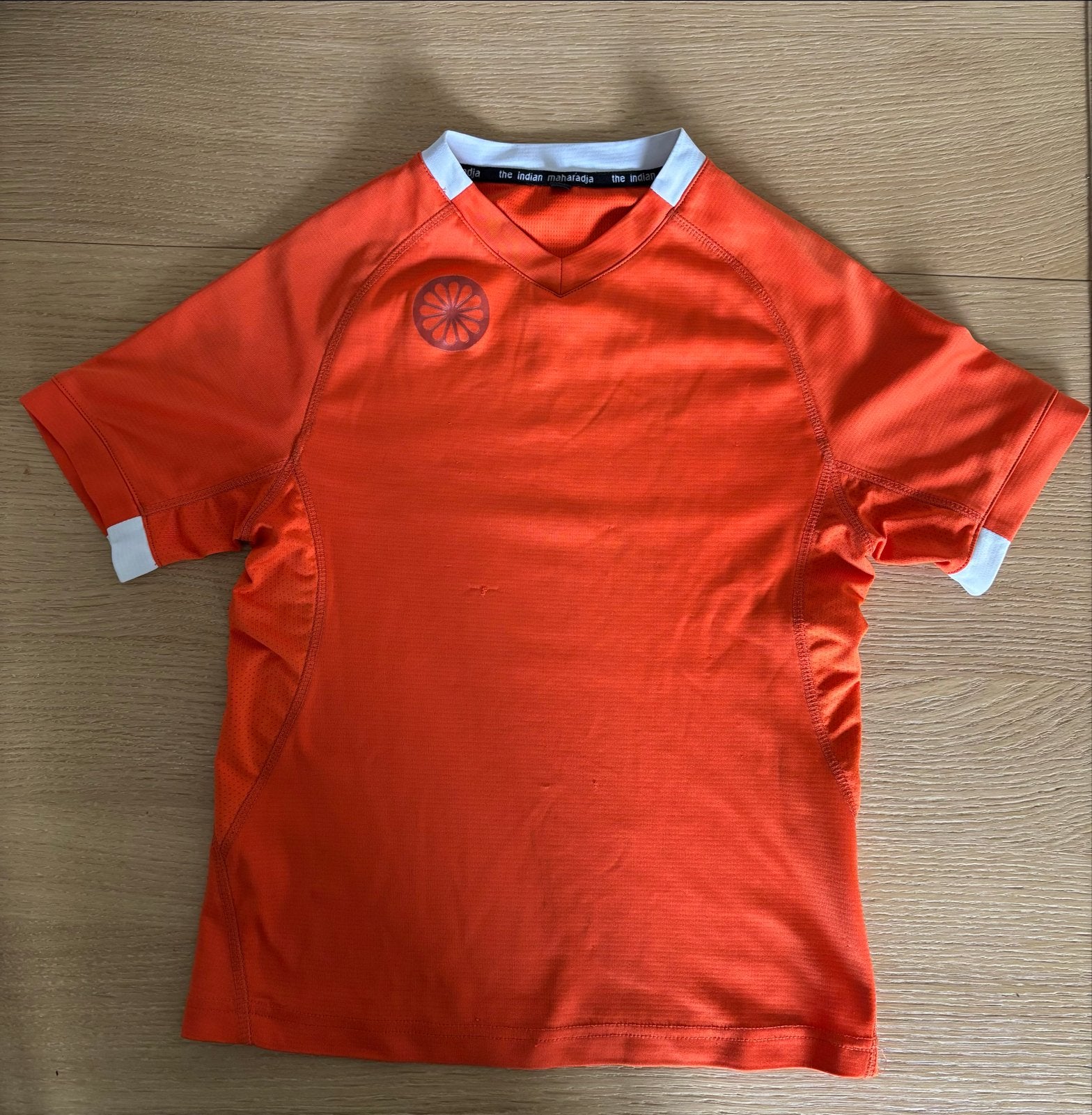 Oranje sportshirt The Indian Maharadja - Maat 128, Ophalen of Verzenden, Gebruikt, Jongen, Sport- of Zwemkleding