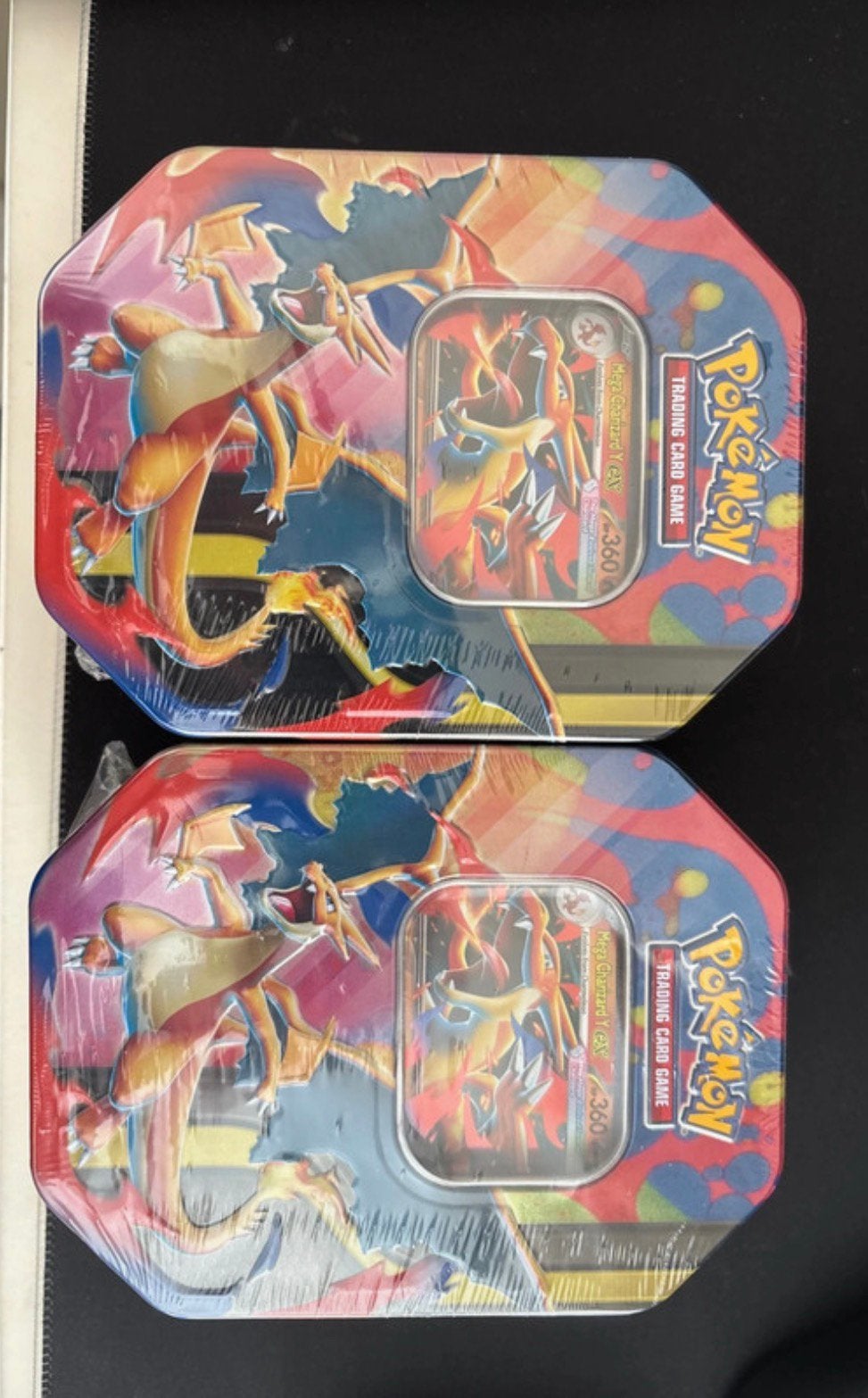 Pokemon Charizard Y tins, Hobby en Vrije tijd, Verzamelkaartspellen | Pokémon, Ophalen of Verzenden, Zo goed als nieuw