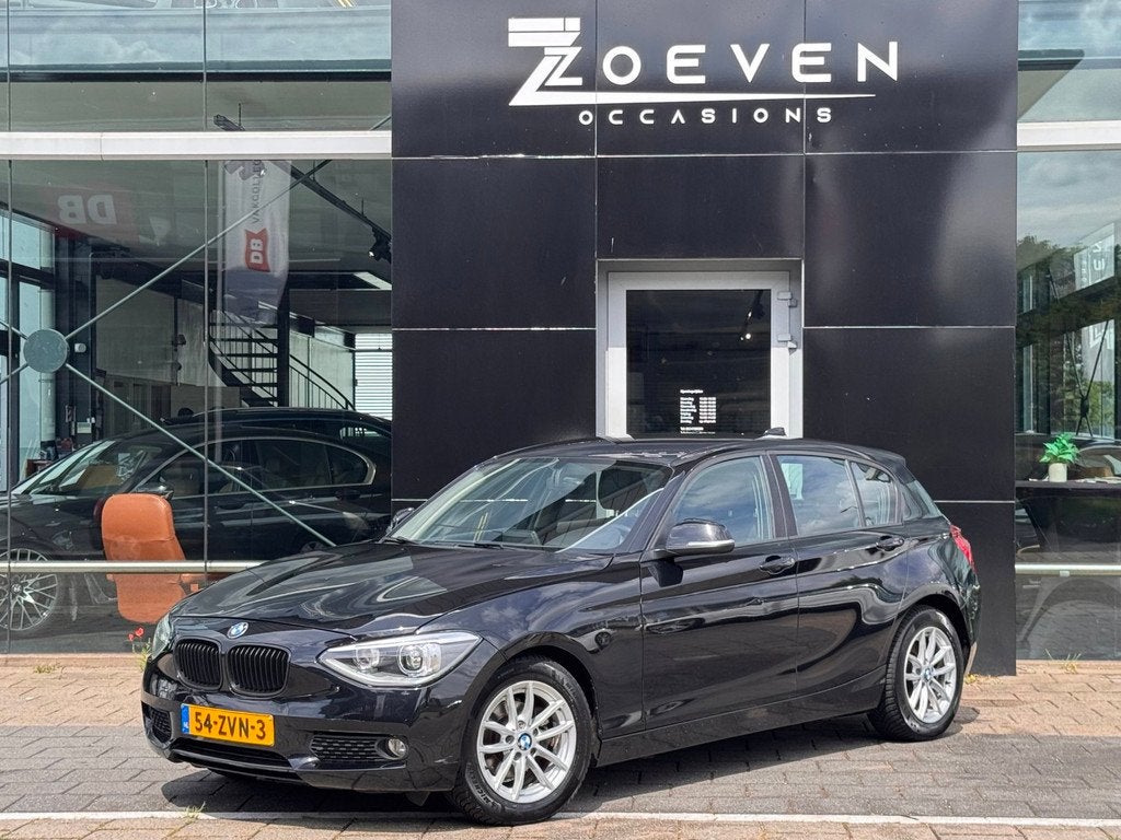 BMW 1-serie 116i Upgrade Edition, Auto's, BMW, 1-Serie, Euro 5, Gebruikt, Zwart