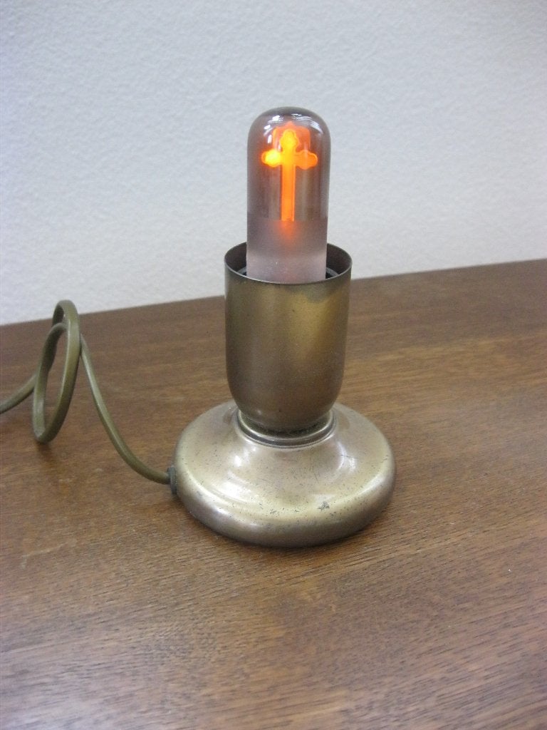kruisje met lichtje, Ophalen