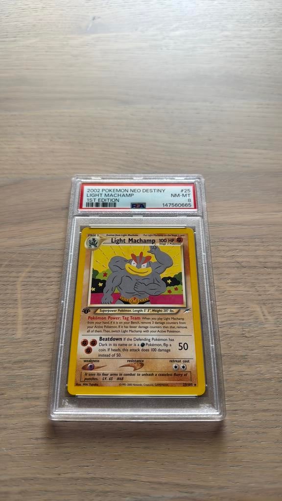Light machamp 1st edition PSA8, Hobby en Vrije tijd, Verzamelkaartspellen | Pokémon, Ophalen of Verzenden, Zo goed als nieuw