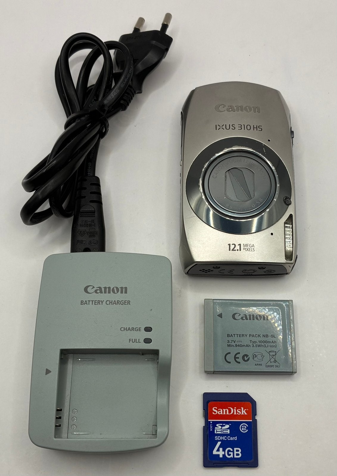 Canon IXUS 310 HS - compact camera, Audio, Tv en Foto, Fotocamera's Digitaal, Ophalen of Verzenden, Zo goed als nieuw, Canon, 8 keer of meer