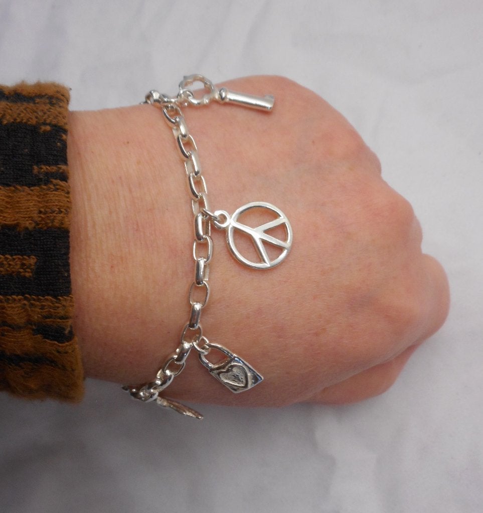 Zilveren bedel armband met 7 mooie bedels nr.114