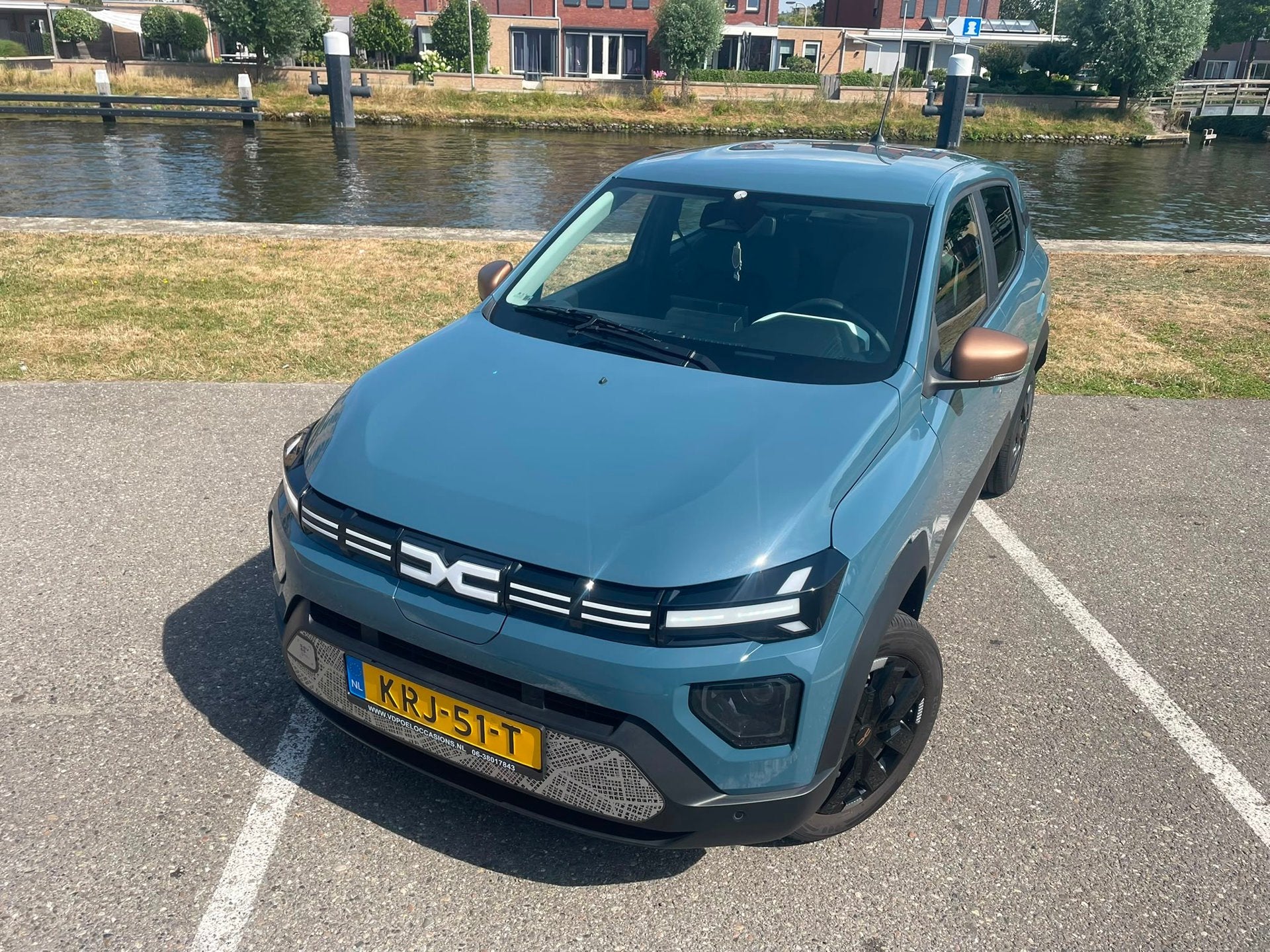 Dacia Spring Extreme 65 26.8 kWh NIEUWSTAAT NAVI AIRCO PDC, Gebruikt, 38 min, Leder en Stof, Origineel Nederlands