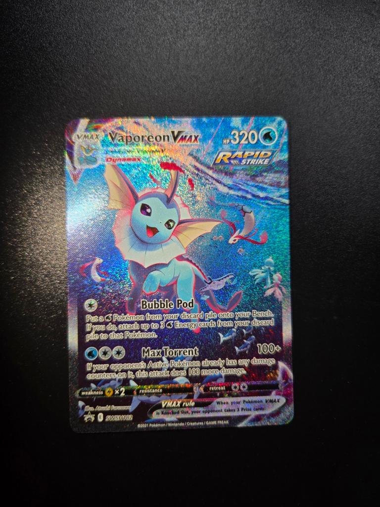 Vaporeon VMAX SWSH182 Pokemon Promo, Ophalen of Verzenden, Zo goed als nieuw, Booster, Foil