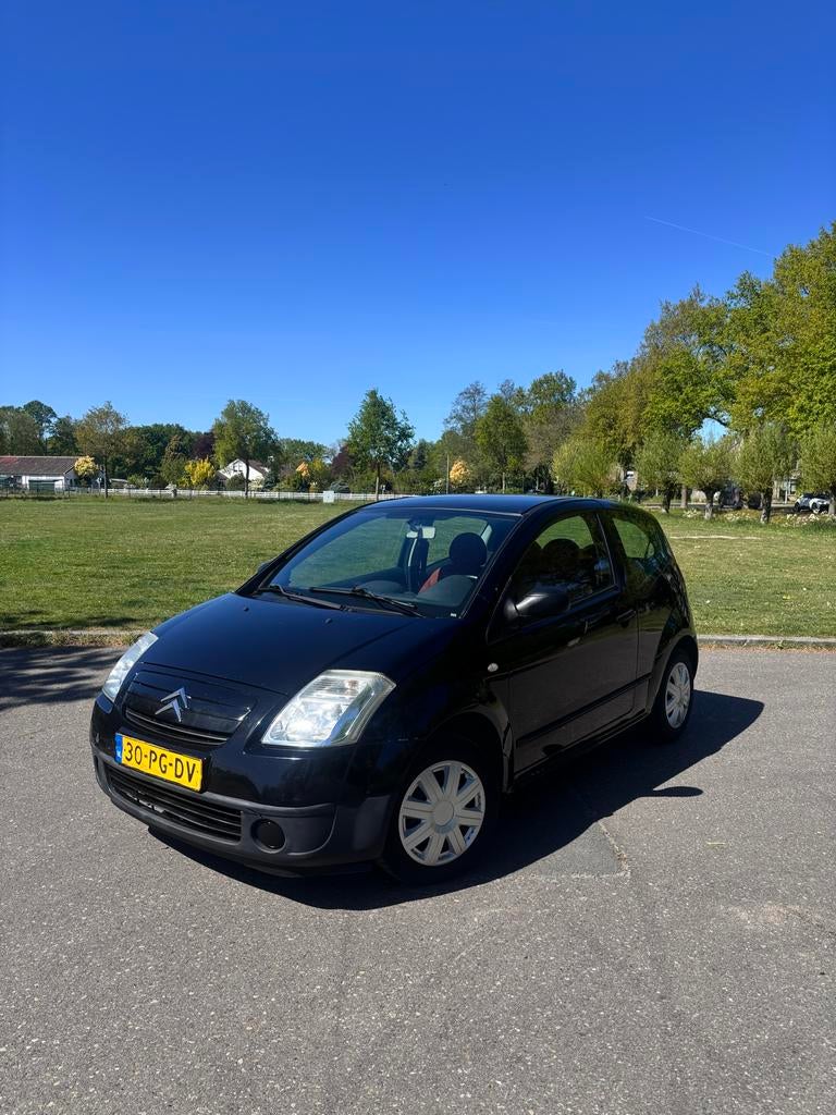 Citroën C2 1.1 2004 Zwart | APK | CARPLAY | NEDERLANDSE AUTO, Auto's, Citroën, Voorwielaandrijving, 450 kg, 525 kg, 31 €/maand