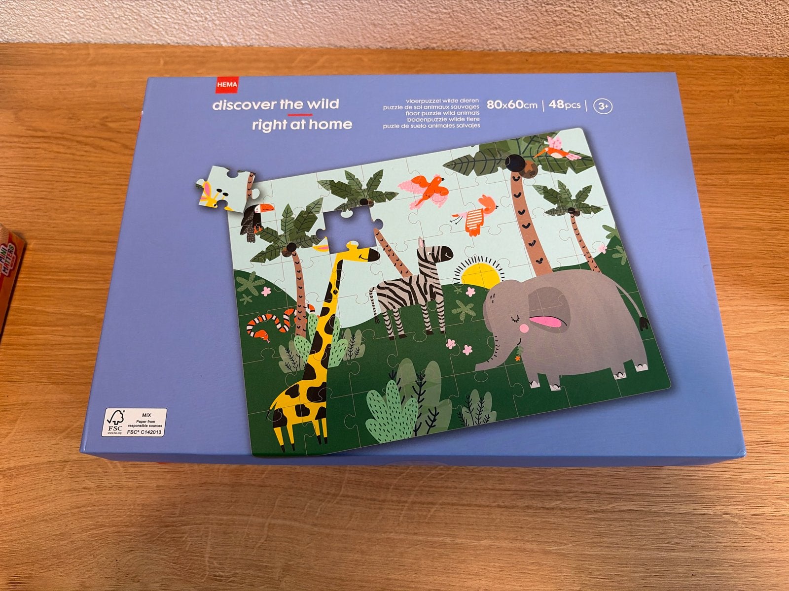Hema Vloerpuzzel 'Discover the Wild' 80x60 cm, Ophalen, 10 tot 50 stukjes, Zo goed als nieuw, 2 tot 4 jaar