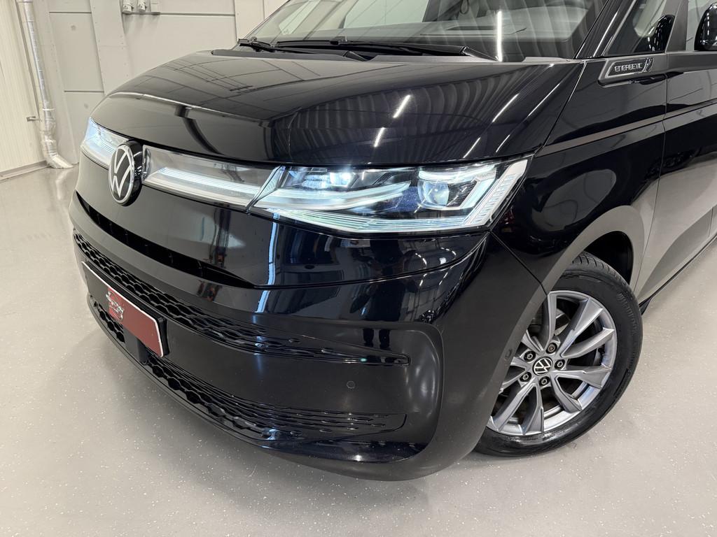 Volkswagen Multivan 1.4 eHybrid L2 Energetic 6p. PANO/TREKHA, Gebruikt, Zwart, Met garantie (alle), 7 stoelen