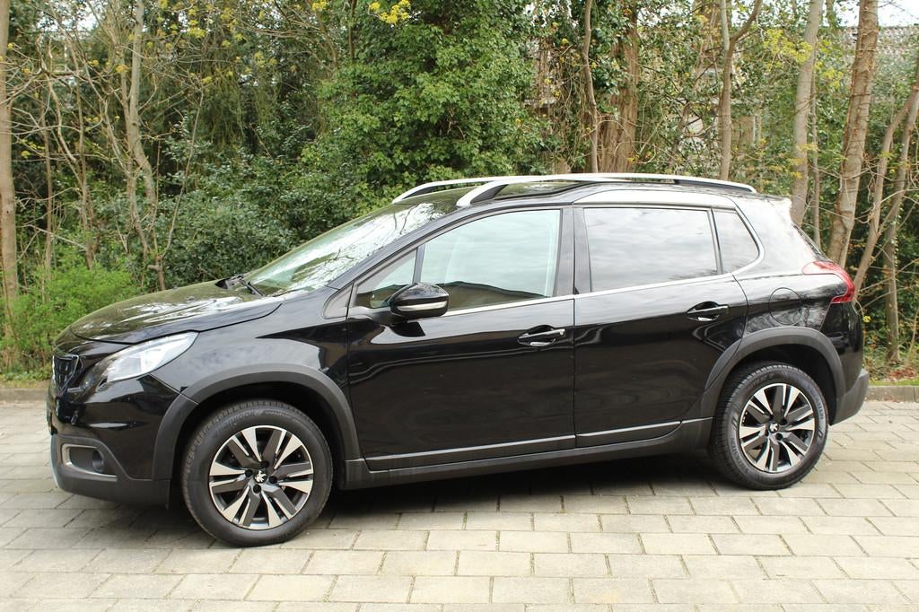 Peugeot 2008 1.2 PureTech GT-line clima cruise navigatie, Voorwielaandrijving, Euro 6, Met garantie (alle), Leder en Stof