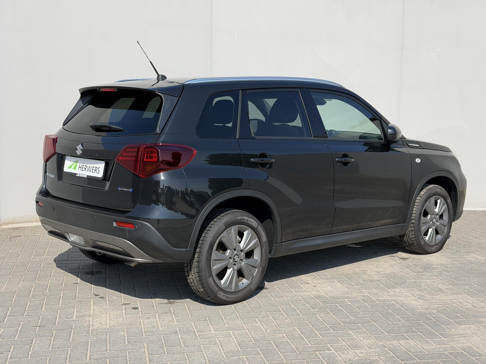 Suzuki Vitara 1.5 Hybrid Style / Fabrieksgarantie tot 1-2028, Auto's, Dealer onderhouden, Gebruikt, 4 cilinders, 400 kg