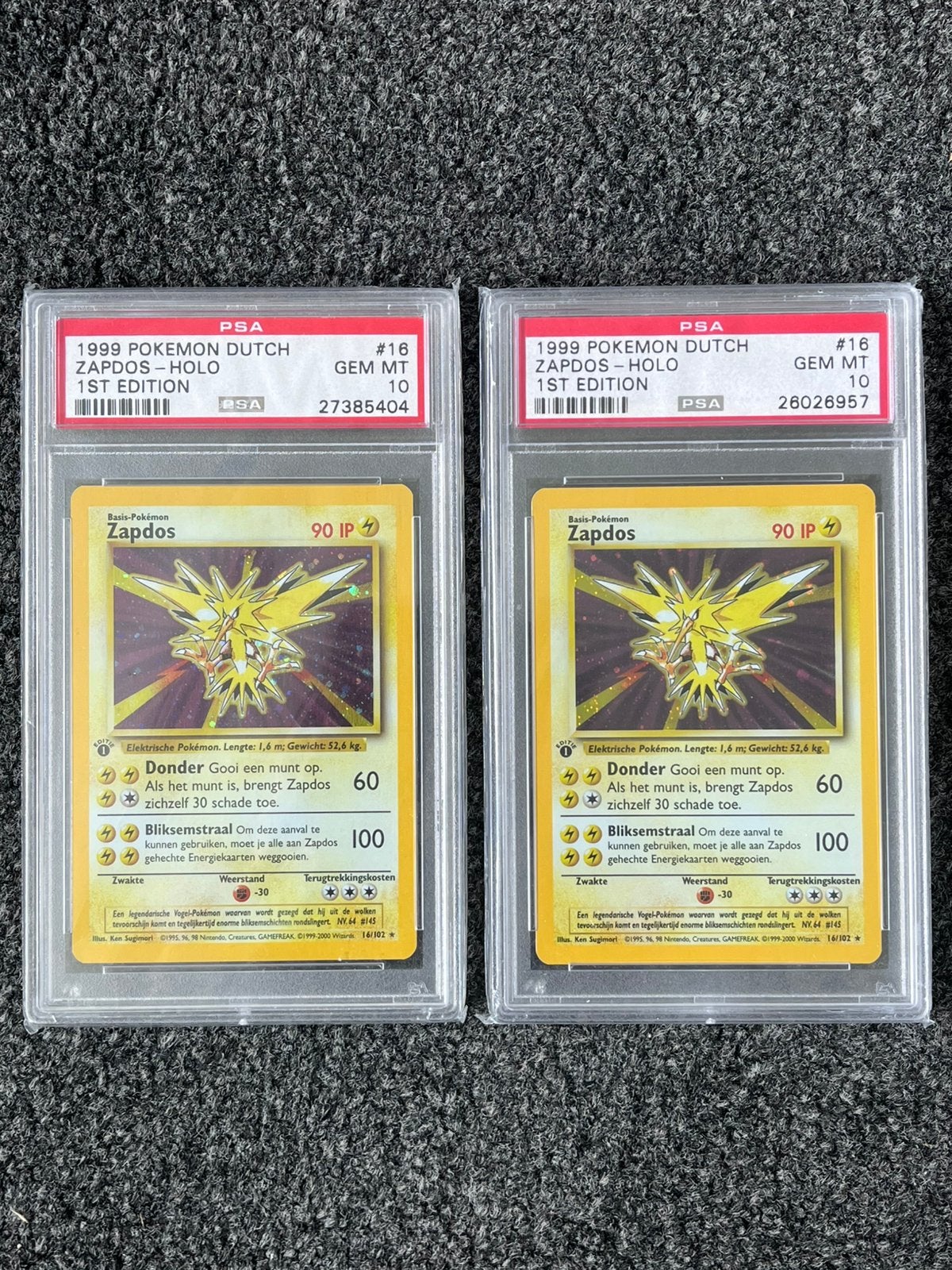 Pokémon 2x PSA 10 Dutch 1st Ed. Zapdos Holo Base set (POP 9), Hobby en Vrije tijd, Verzamelkaartspellen | Pokémon, Ophalen of Verzenden