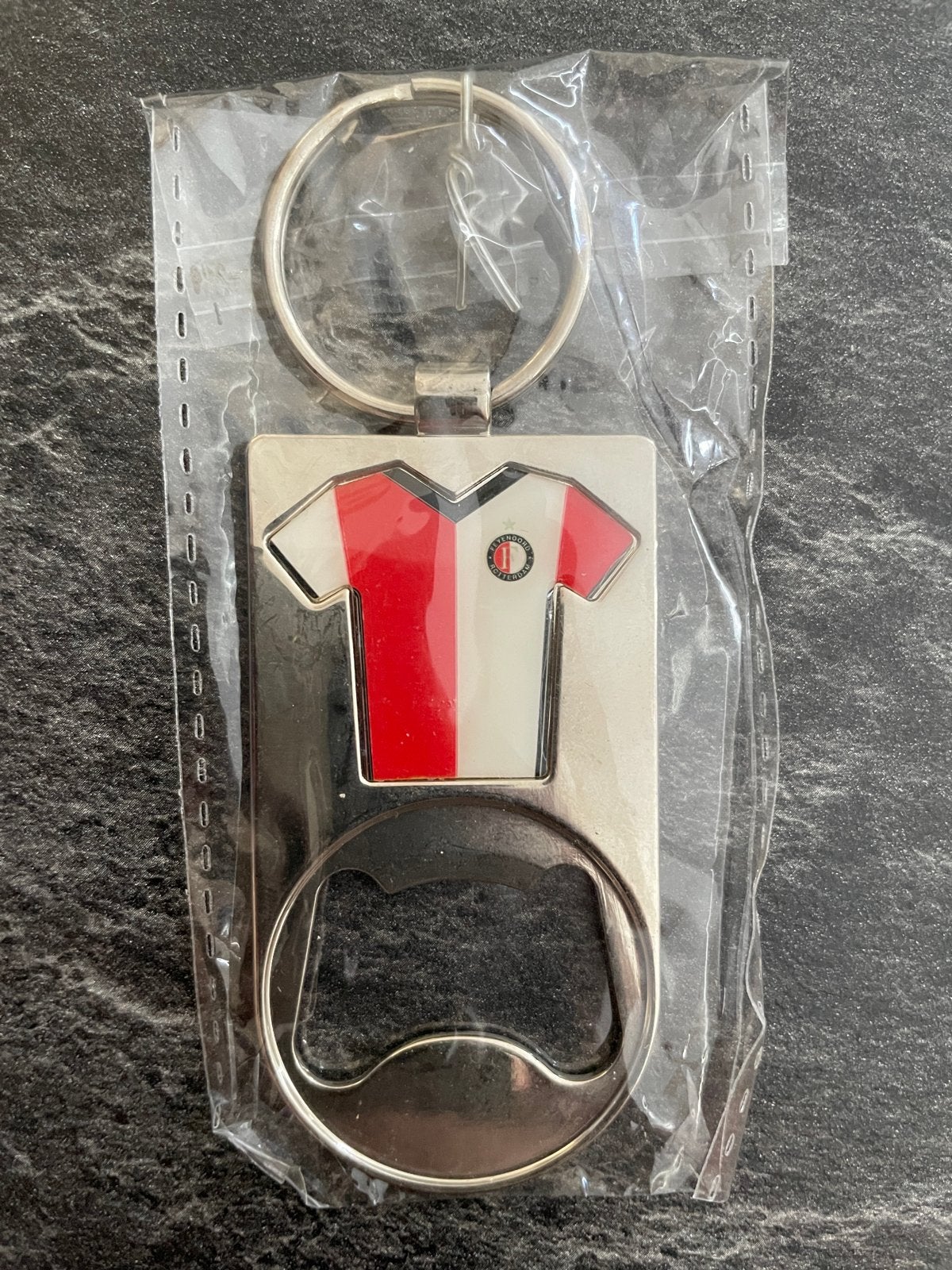 Sleutelhanger van feyenoord/heineken, Verzamelen, Ophalen of Verzenden, Zo goed als nieuw, Sport