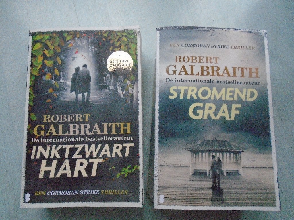 inktzwart hart & stromend graf, robert galbraith, Ophalen of Verzenden, Zo goed als nieuw, J.K. Rowling