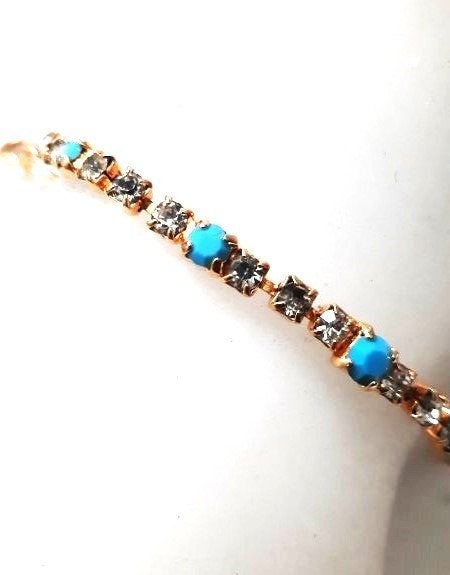 Schitterende Goudkleurige Tennisarmband met Turquoise, Ophalen, Nieuw, Goud