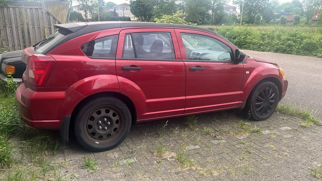 Dodge Caliber 1.8 2006 Rood, Auto's, Dodge, Voorwielaandrijving, 1295 kg, 1200 kg, Handgeschakeld