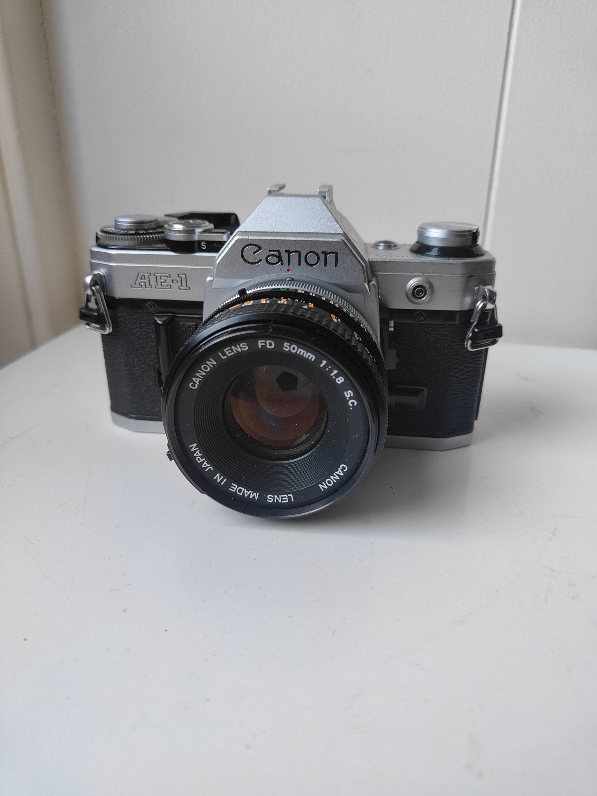 Canon AE-1 Spiegelreflexcamera met FD 50mm f/1.8 S.C. lens, Audio, Tv en Foto, Ophalen of Verzenden, Gebruikt, Spiegelreflex, Canon