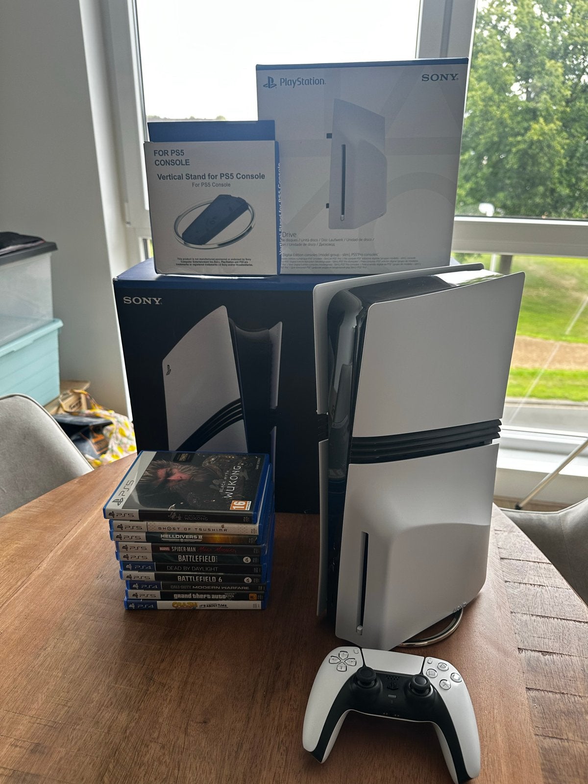 PlayStation 5 Pro met 9 games en extra's, Online, Overige genres, Ophalen of Verzenden, Zo goed als nieuw