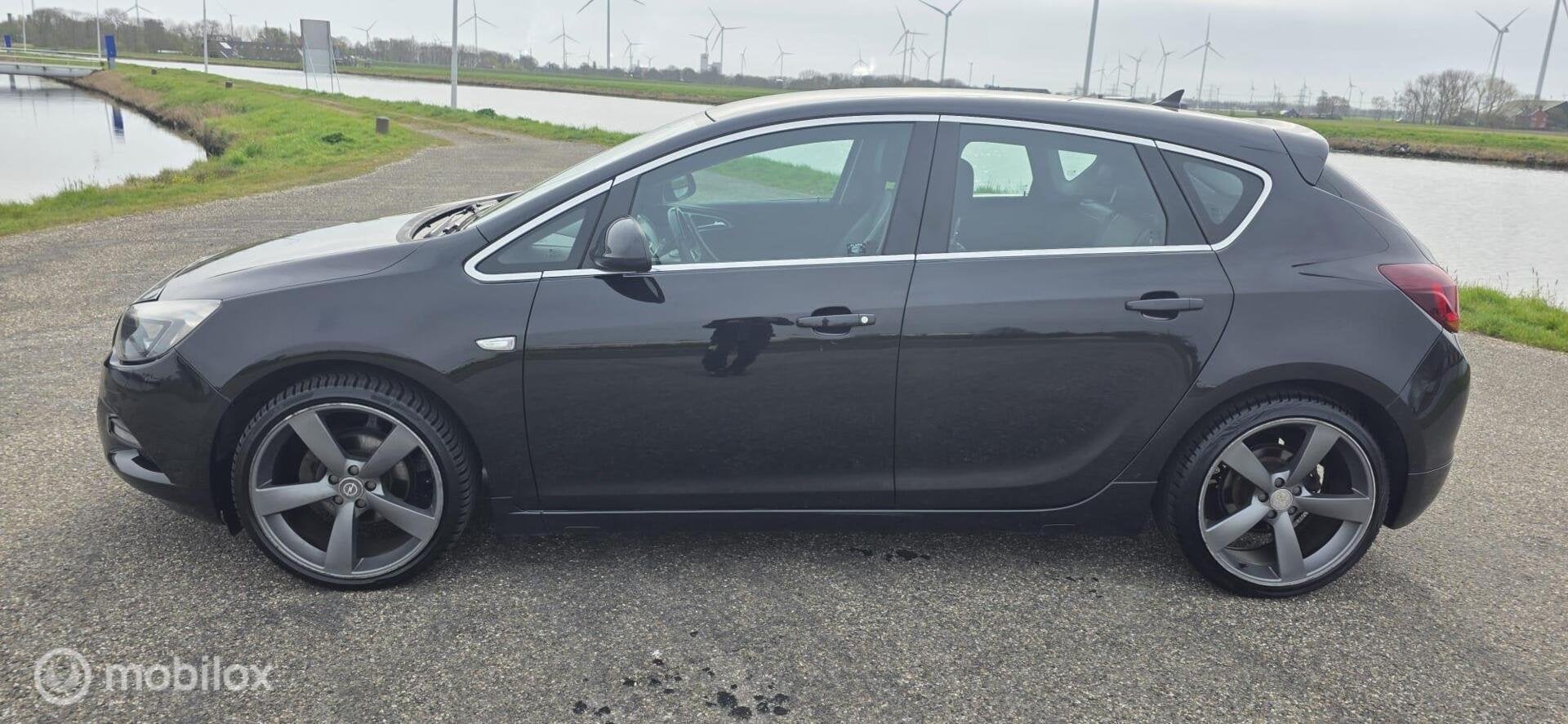 Opel Astra 1.4 Turbo Sport, Auto's, Opel, Voorwielaandrijving, Euro 5, Gebruikt, 680 kg