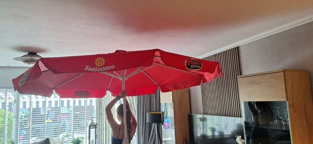 parasol, Ophalen, Zo goed als nieuw