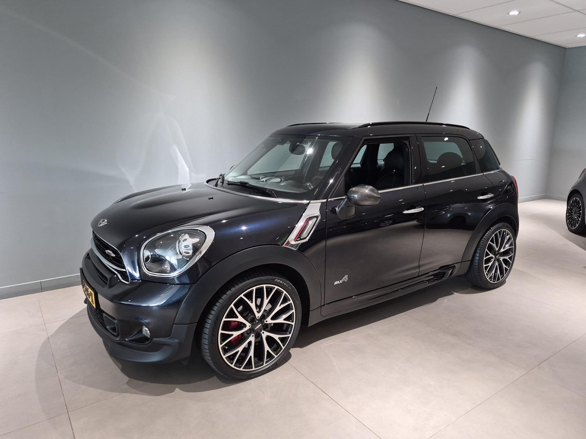 Mini Countryman JCW 1.6 218pk ALL4 Aut. John Cooper Works Na, Auto's, Automatische klimaatregeling, Gebruikt, Zwart, 1405 kg