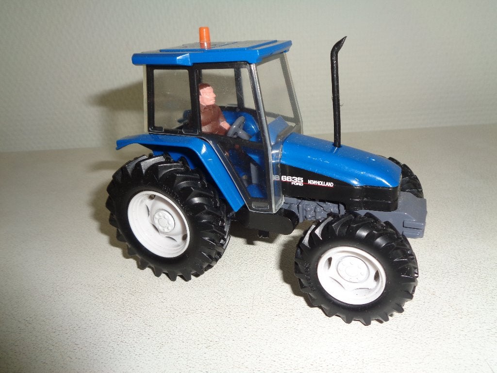 Britains New Holland  Ford 6635., Ophalen of Verzenden, Zo goed als nieuw, Tractor of Landbouw, Britains