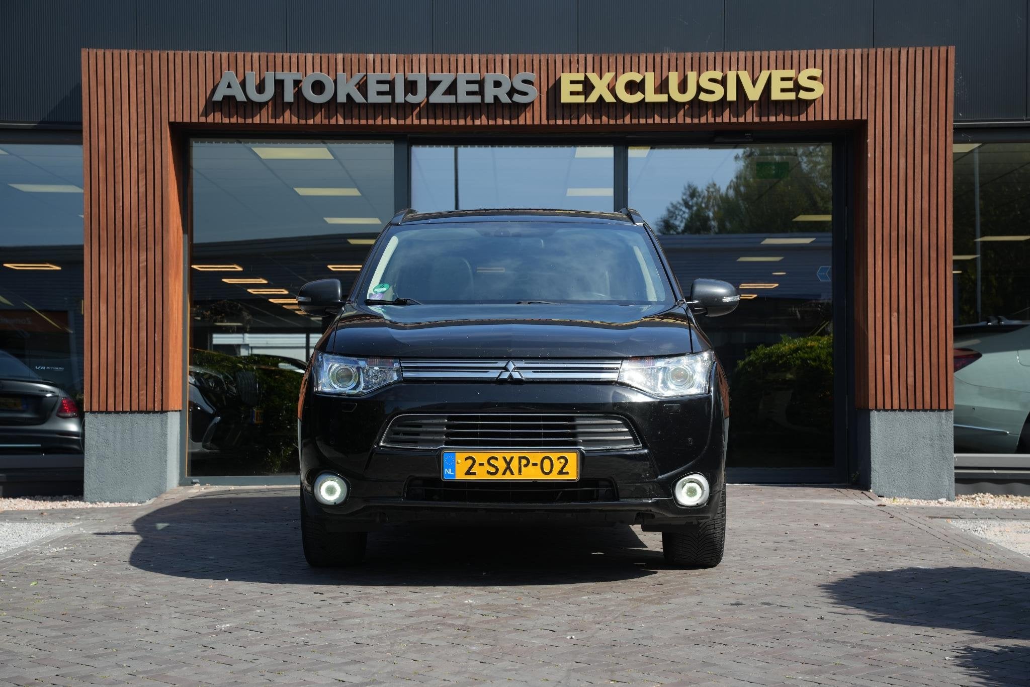 Mitsubishi Outlander 2.0 PHEV instyle Navi Leer PDC Clima St, Auto's, Mitsubishi, 1998 cc, Euro 6, 4 cilinders, Zwart