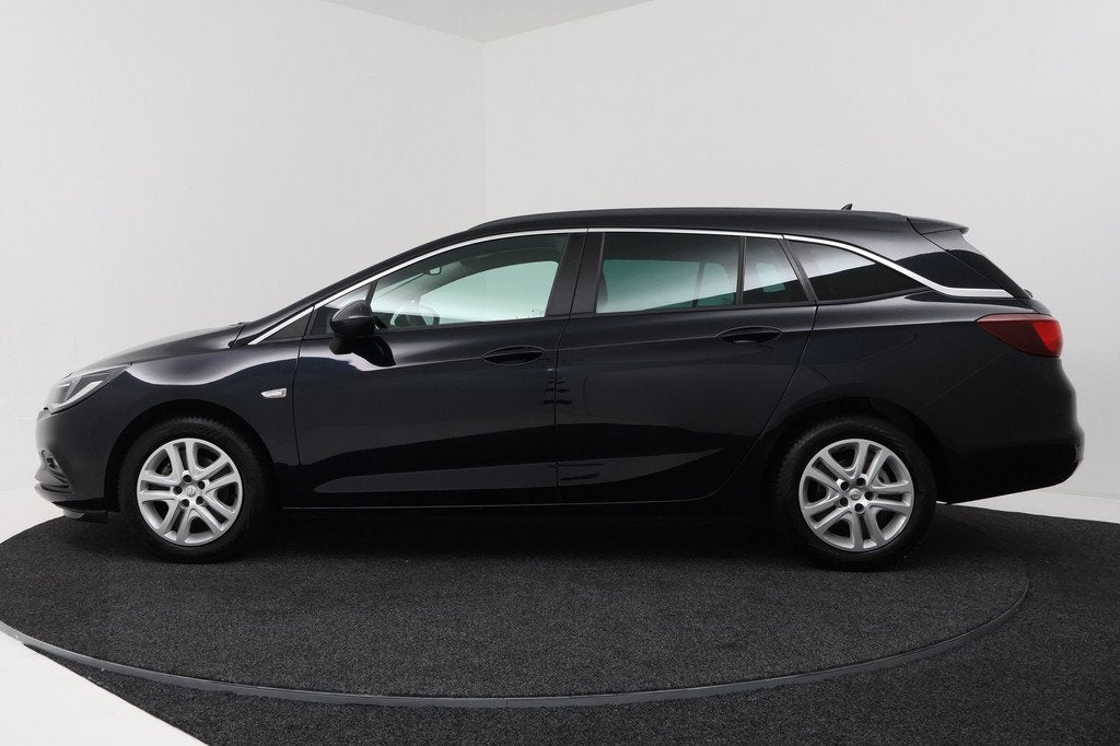 Opel Astra Sports Tourer 1.4 Business+ (PARKEERSENSOREN, CRU, Voorwielaandrijving, Stof, Gebruikt, 4 cilinders