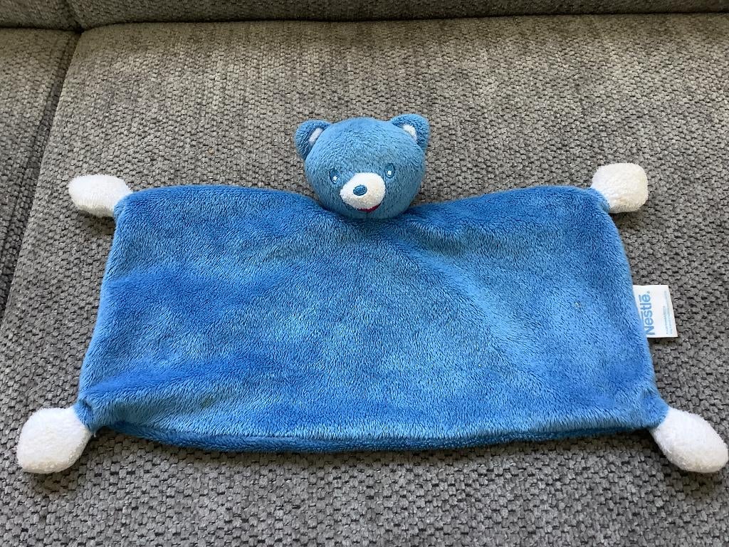 beer knuffeldoekje lapje Nestle blauw  3,50 euro, Ophalen of Verzenden, Zo goed als nieuw, Overige typen