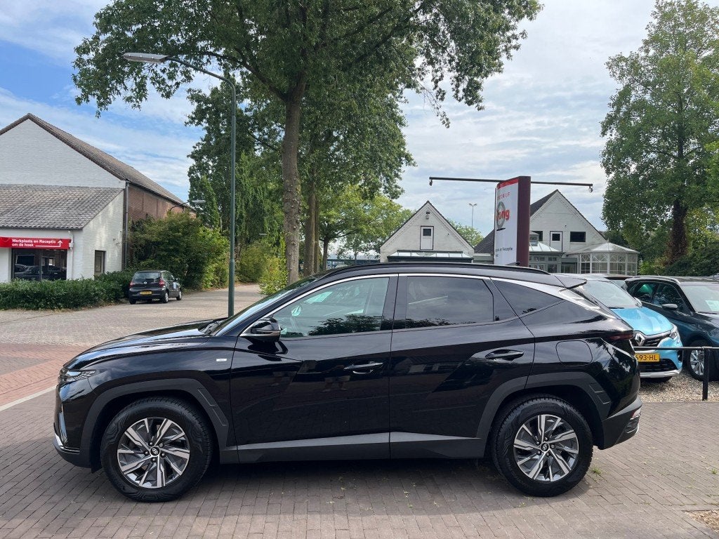 Hyundai TUCSON 1.6 T-GDI MHEV / NAVI / CAMERA / STOELVERW. /, Auto's, Voorwielaandrijving, 15 km/l, Gebruikt, 4 cilinders
