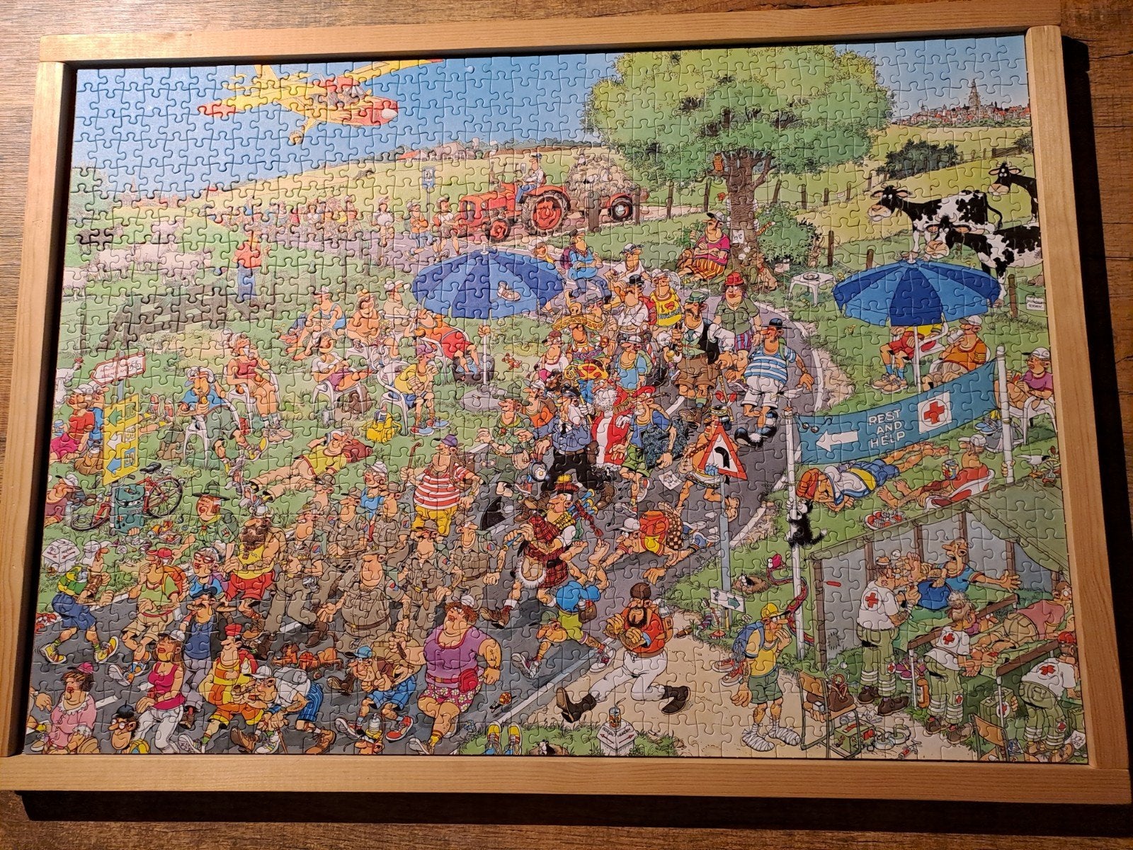 Foto 5 van Jan van Haasteren puzzels 3 x 1000st. Compleet  pas gelegd.