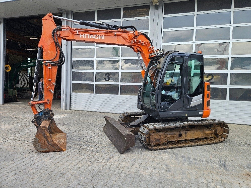 Hitachi ZX85US-6, Ophalen of Verzenden, Graafmachine