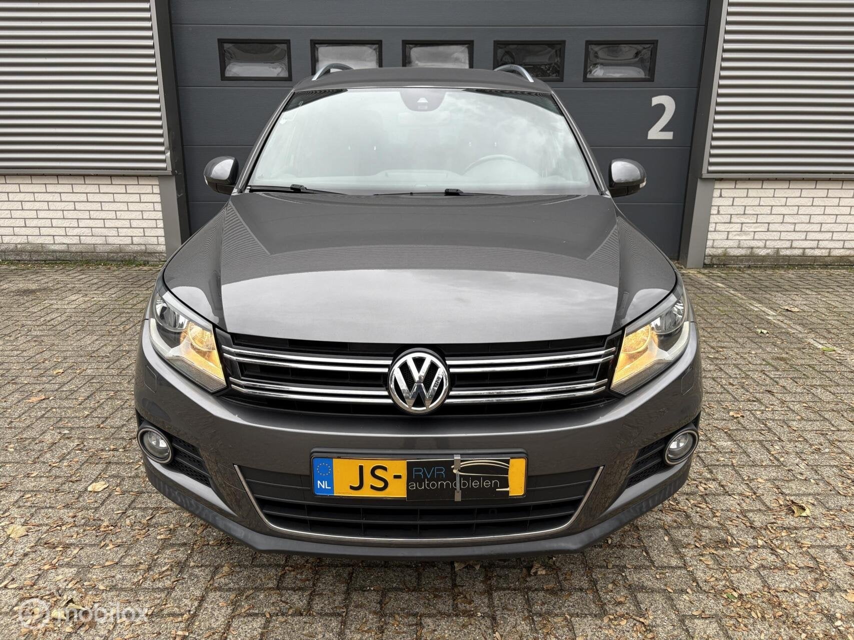 Volkswagen Tiguan 1.4 TSI Sport&Style LEES ADVERTENTIE!, Voorwielaandrijving, Gebruikt, Zwart, 4 cilinders