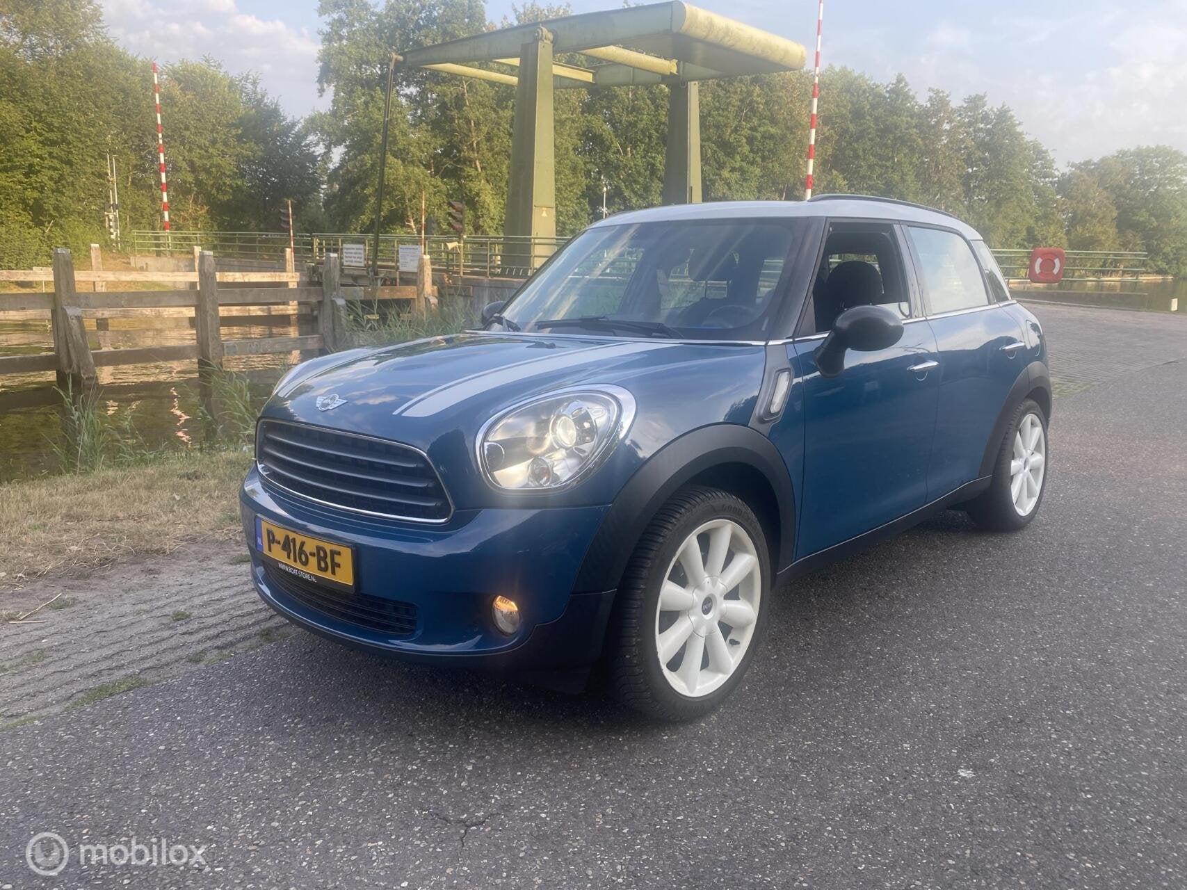 Mini Countryman 1.6 Cooper Business Line/Pano dak/AC/ST VW!, Voorwielaandrijving, Euro 5, Gebruikt, Blauw