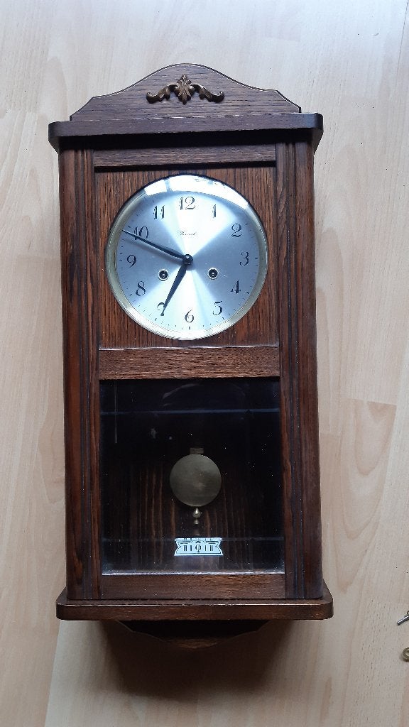Oude werkende opdraai klok / wandklok Warmink, Ophalen, Bruin, Met slinger, Analoog