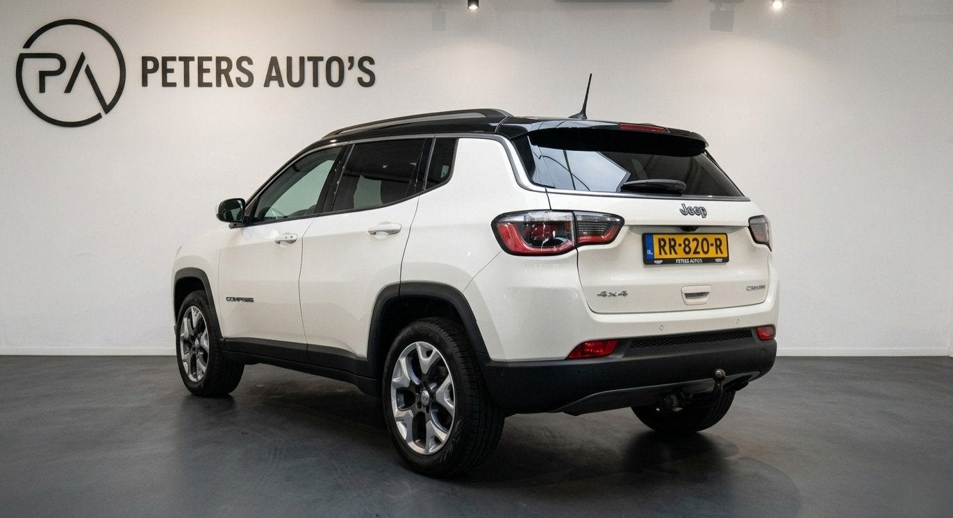 Jeep Compass 1.4 MultiAir Limited 4x4 Panoramadak/Leder/Trek, Auto's, Jeep, Automaat, Dealer onderhouden, 450 kg, Gebruikt